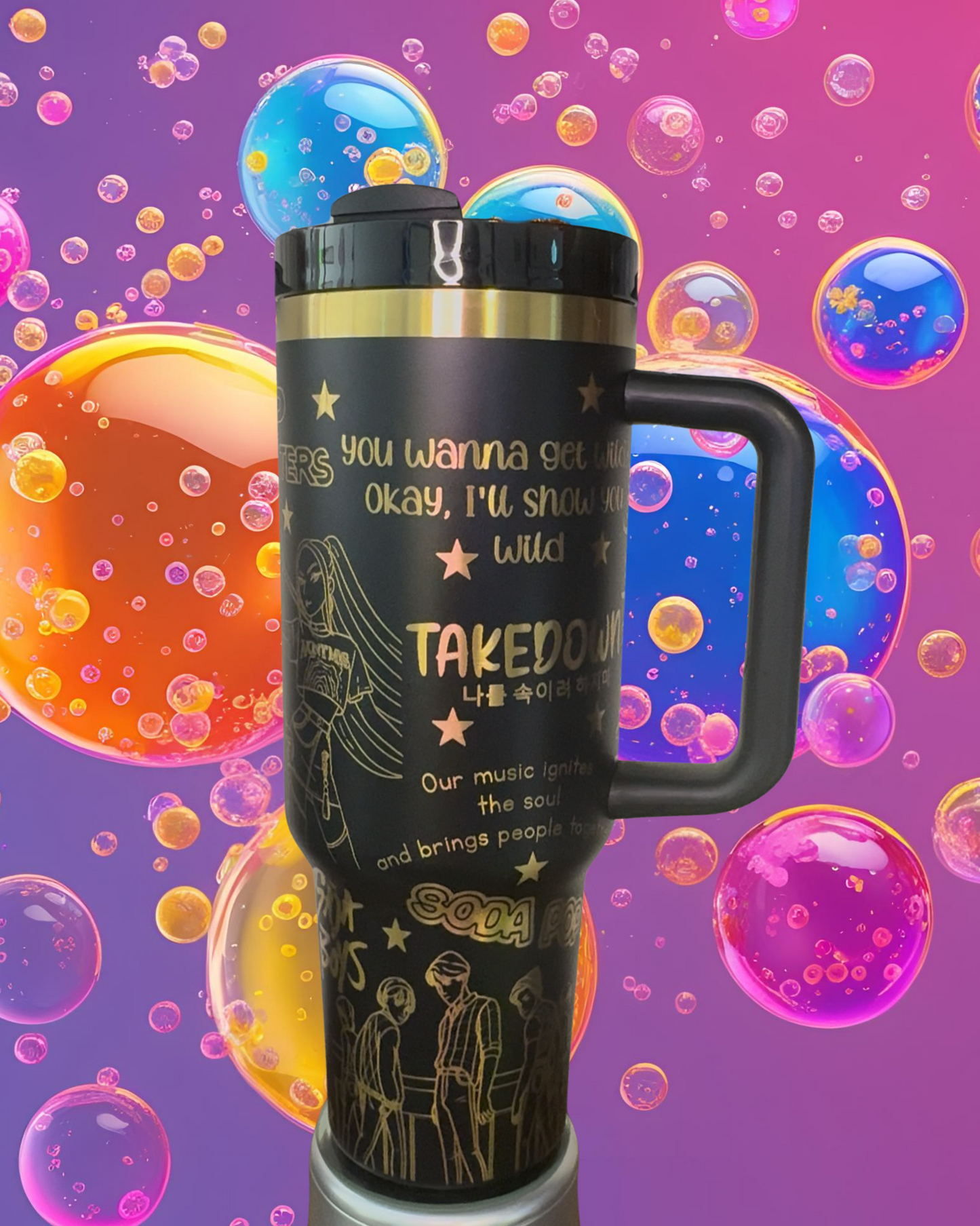 A black and gold insulated tumbler mug with a handle, featuring a design with stars and bubbles, and text that reads "You wanna get me? okay, I'll show you wild" and "TAKEDOWN" along with some Korean text.