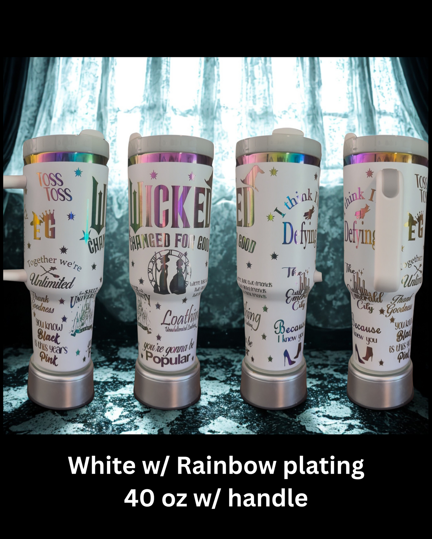 Four white and rainbow-plated 40 oz w/ handle travel mugs, each with various sayings and designs printed on them.